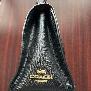 Coach Black Leather Hand or Crossbody style Coach Bag Chic and Trendy